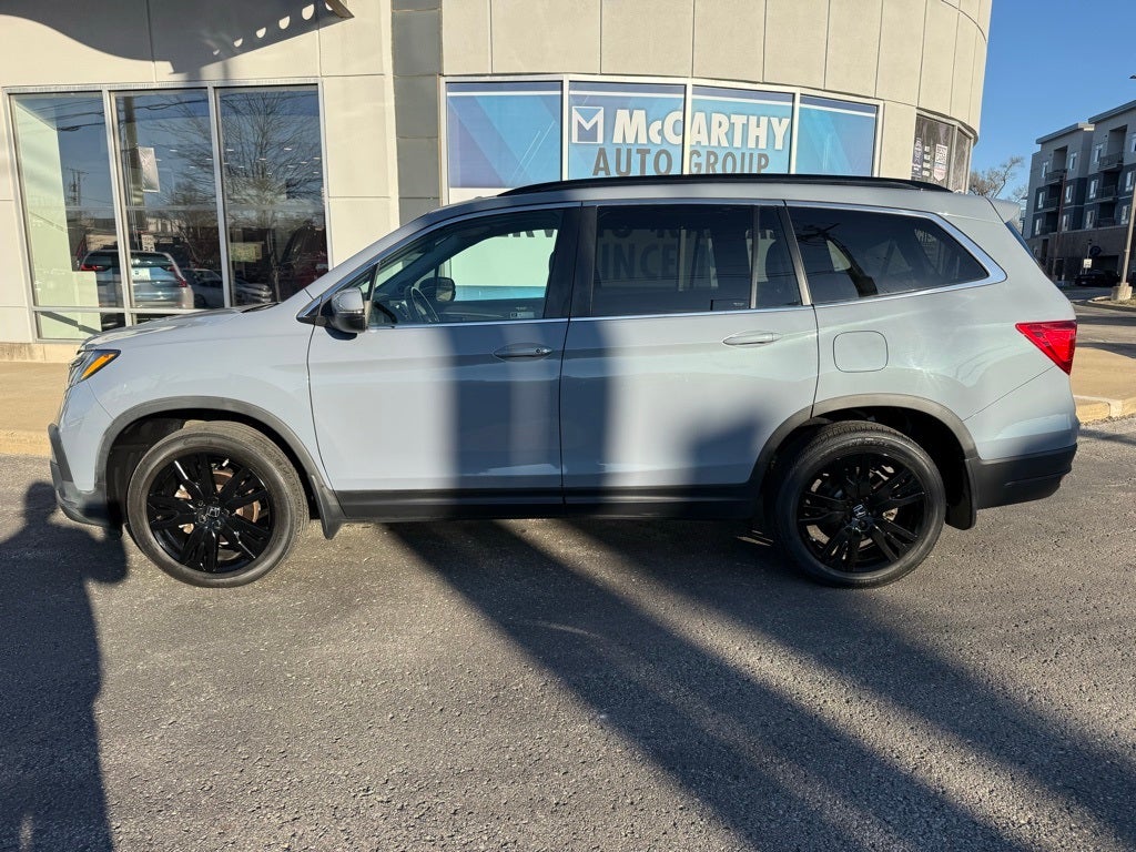 Used 2023 Honda Passport EX-L with VIN 5FNYF8H51PB009799 for sale in Kansas City