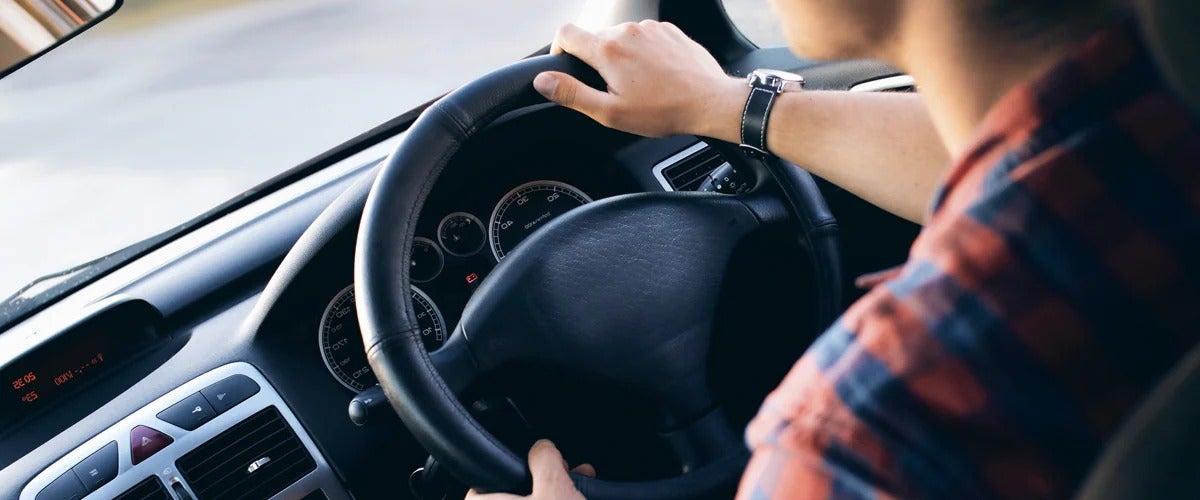 image of a person driving